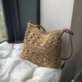 Handwoven beige straw shoulder bag with brown leather strap and hollow diamond pattern - Khaki