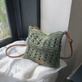 Green crochet woven shoulder bag featuring brown faux leather strap and buckle detail - Green