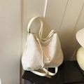 Creamy white hobo bag featuring floral embroidery and decorative beads - White