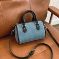 Blue denim mini pillow bag with black leather handles and adjustable shoulder strap - Black
