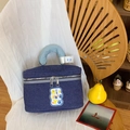 Dark blue denim makeup bag with cartoon letter patch and light blue padded handle - Blue