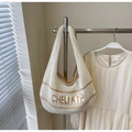 Detail of hollow knit tote bag with coffee trim and CHELI KYP letter pattern design - Khaki