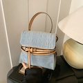 Retro light blue denim handbag with brown leather straps and gold buckle accents - Blue