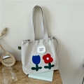 Beige canvas tote bag with tulip embroidery and ruffle details for women - Off-white