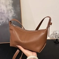 Minimalist brown half-moon shoulder bag in matte faux leather with adjustable strap - Brown