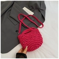 Handmade crochet bucket bag in hot pink with woven handle and shoulder strap - Rose Pink
