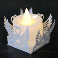 Hollow rose paper lampshade with swan pattern for LED candle on wooden background - White