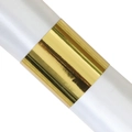 Close-up of a polished gold metal napkin ring paired with white silk fabric detail - Mirror Gold