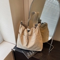 Minimalist beige nylon tote bag with drawstring closure and wide shoulder strap - Khaki