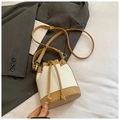 Two-tone bucket bag with litchi grain texture and gold drawstring hardware - White Khaki Without Pendant