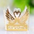 Detail of laser-cut golden swan cupcake wrappers with elegant rose patterns for parties - Reflective Gold