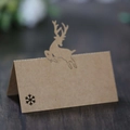 Brown kraft paper table tent card with laser-cut reindeer and snowflake for Christmas - Kraft Paper