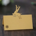 Champagne gold laser-cut reindeer place cards for wedding and Christmas party tables - Gold