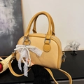Ginger yellow lychee texture Boston bag with elegant pearl lace bow charm - Biscuit