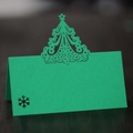 Detail of laser-cut Christmas tree place card in emerald green with snowflake design - Dark Green