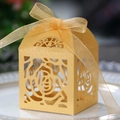 Golden laser cut rose hollow wedding candy box with elegant silk ribbon bow decoration - Gold