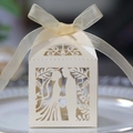 Detail of laser-cut heart and couple design on white wedding favor gift box with ribbon - Jewelry Cream Star