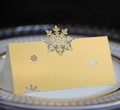 Detailed laser-cut snowflake place card in gold paper for Christmas table settings - Reflective Gold
