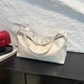 Chic cream white patent leather underarm bag with decorative silver metal studs - White