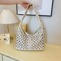 Chic cream-colored hobo bag featuring decorative silver studs and large capacity - Off-white