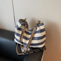 Blue and beige striped woven straw tote bag with brown faux leather shoulder straps - Blue