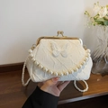 Elegant cream-white retro frame bag featuring lace butterfly and pearl handles - Off White