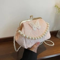 Sweet pink pleated pearl handbag featuring butterfly embroidery and gold metal clasp - Pink
