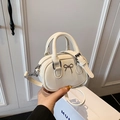Mini cream white faux leather bowling bag with metallic bow and adjustable strap - Off White