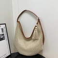 Beige straw woven hobo bag with dark brown leather straps and decorative fringe tassel - Off White