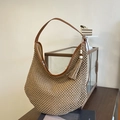 Large beige straw woven tote bag with brown leather handles and a fringe tassel charm - Khaki