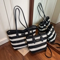 Striped black and white woven bucket bag set in large and small sizes with shoulder straps - Black Large