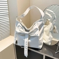 White faux leather tote bag featuring a large bow and silver stud details - White
