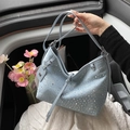 Light blue denim handbag with sparkling rhinestones and adjustable shoulder strap - Blue