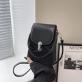 Vertical black crossbody phone bag with pleated faux leather texture and silver buckle - White