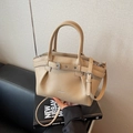 Khaki pebbled leather handbag with pleated wing design and adjustable crossbody strap - Khaki