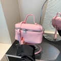 Mini borsa rosa in pelle a grana di litchi con manico e cerniere in metallo argentato - Rosa