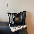 Retro black leather tote bag with elegant white lace and pearl bow charm detail - Black