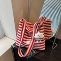 Red and white striped canvas tote bag with a plush cloud charm and wide strap - Red With Cloud Pendant