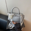 Mini borsa a secchiello in morbida pelle argento con cuore di perle e fiocco di pizzo - Argento (Con Ciondolo in Perla)