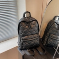 Chic black quilted backpack with diamond stitching and lightweight bubble fabric design - Black
