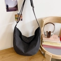 Dark gray grid pattern nylon dumpling bag with adjustable shoulder strap for daily use - Black