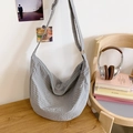 Chic light grey checkered nylon hobo bag with adjustable strap in a stylish design - Gray