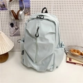 Minimalistische mintgroene waterdichte nylon rugzak met verticale ritszak voor reizen - Lichtblauw