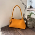 Ginger yellow woven leather hobo shoulder bag with textured handle and side charm detail - Yellow