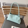 Minimalist mint green woven leather baguette bag with a stylish cross-weave texture - Blue