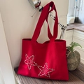 Grande borsa tote in tela rossa da donna con decorazioni di stelle in metallo argento - Rosso