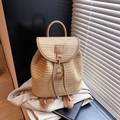 Handwoven straw backpack for women in beige and light brown trim with drawstring - Khaki