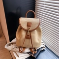 Beige straw woven backpack with brown leather trim and golden metal buckle - Brown