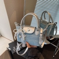 Light blue denim mini handbag with silver handle and elegant pearl bow charm - Blue with Charm