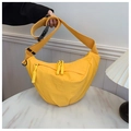 Detail of yellow nylon half-moon crossbody bag with wide strap and woven zipper puller - Standard / Yellow